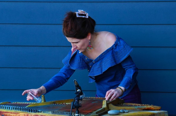 Jennifer Wright and her "deconstructed piano" at the Body/Language arts and culture festival. Photo by Matias Brecher.