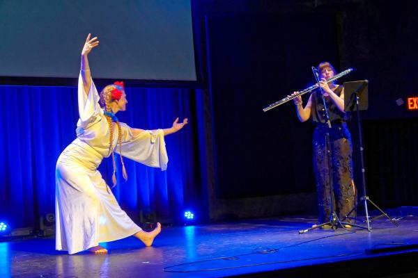 Flutist Amelia Lukas and dancer Tiffany Loney at Alberta Rose for "Natural Homeland: Honoring Ukraine" concert. Photo by Joe Cantrell.
