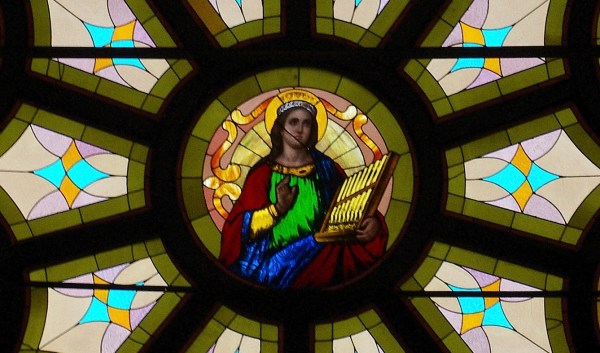 St. Cecilia and medallions, stained glass, Church of Saint John the Evangelist in Columbus, Ohio. Photo by Nheyob.