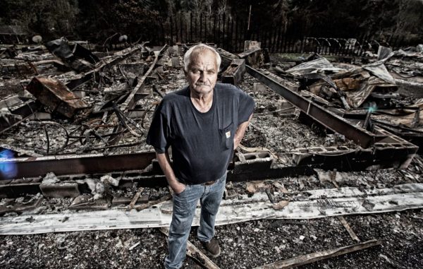 Bruce MacGregor photographed Larry on Sept. 20, after his Otis home was destroyed in the Echo Mountain fire, then looted. Photo by: Bruce MacGregor