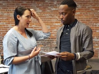 Gigglefest 2.ohhh! director Cassandra Schwanke discusses a scene with comic Chad Sharpe before a rehearsal. Photo by: David Bates