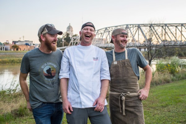 Chef Chris Holen (middle) met with Delta Supper Club chefs Stewart Robinson (left) and David Crews in Greenwood, MS, in 2018. On March 14, he will welcome them to Astoria for RIVER2RIVER, a Southern family-style dinner that is part of an effort aimed at exposing the world’s chefs to diverse cultural experiences. Photo by: Rory Doyle