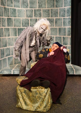 Marley’s Ghost (played by Richard Bowman) confronts Scrooge (Darren Hull) in 2017’s production of “A Christmas Carol: The Musical.” Photo by: George Vetter, courtesy Coaster Theatre Playhouse