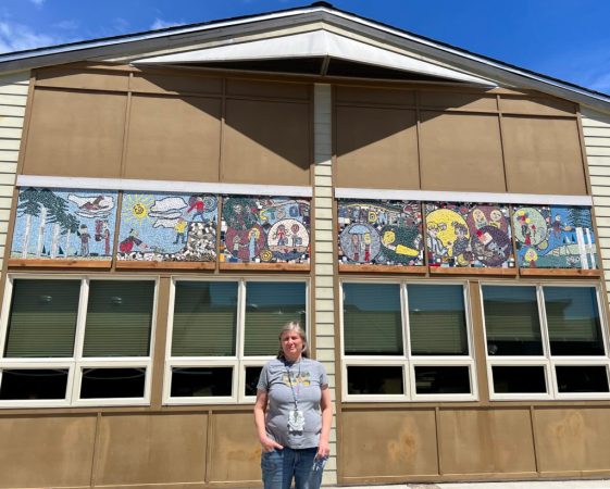 Crestview Heights special education teacher Cristal Arden helped bring the idea of a student designed and built mural showing acts of kindness to fruition, with the help of a coastal arts nonprofit. Photo by: Quinton Smith/YachatsNews.com