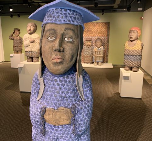 "Dreamer," by George Rodriguez, greets visitors at the Hallie Ford Museum of Art as they enter the chamber featuring the sculpture series "Sanctuary" (2017, stoneware with glass, courtesy of the artist and the Foster/White Gallery in Seattle). Photo by: David Bates