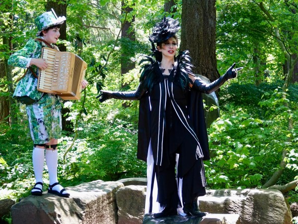 Erica Jaturaporn as the Black-capped Chickadee and Maeve Stier as The Birder in Renegade Opera's "Bird Songs of Opera" at Leach Botanical Garden. Photo by Kristin Sterling.