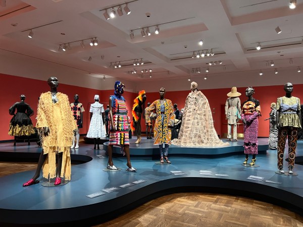 Installation view of Africa Fashion with mannequins in diverse