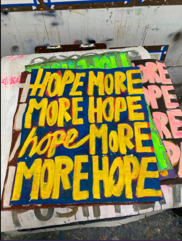 Painting with the words "Hope More." Photo: Thérèse Murdza